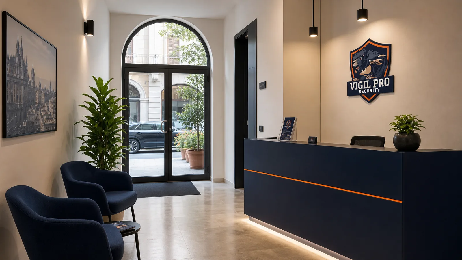Ingresso con arco vetrato della sede Vigil Pro Security a Milano, banco reception navy con logo aziendale e vista esterna su Piazza Santo Stefano